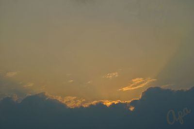 Low angle view of dramatic sky during sunset