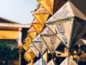 Close-up of text hanging against wall