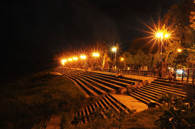 Illuminated street lights at night