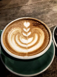 Close-up of cappuccino on table