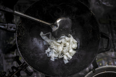 Close-up of noodles in a wok