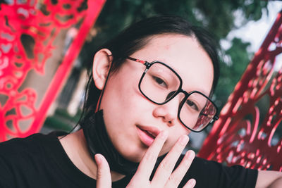 Portrait of young woman looking away