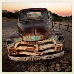 Close-up of abandoned car