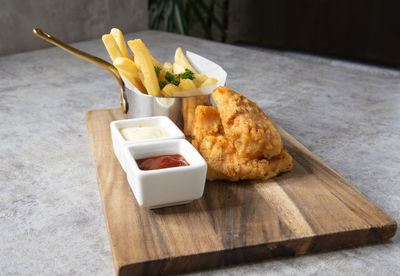 Close-up of served food on table