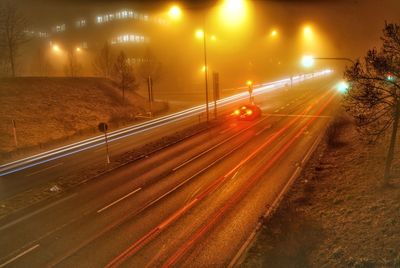 Light trails on road at night