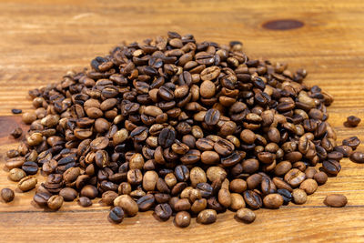 Close-up of coffee beans on table