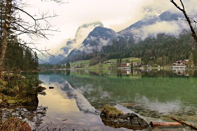 Scenic shot of reflection of mountain range in lake