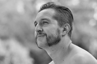 Portrait of young man looking away