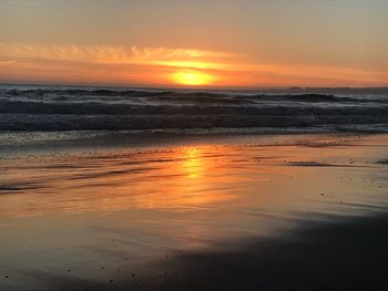 Scenic view of sea against sky during sunset