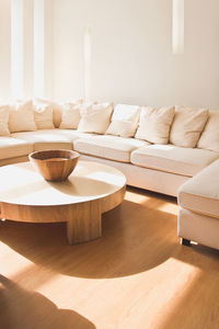 Table and chairs on hardwood floor at home