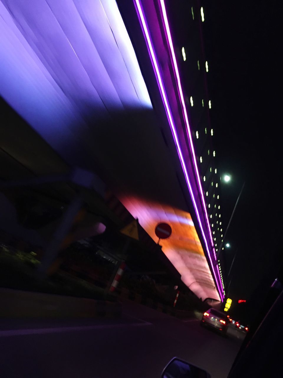 LOW ANGLE VIEW OF ILLUMINATED LIGHTS IN CEILING