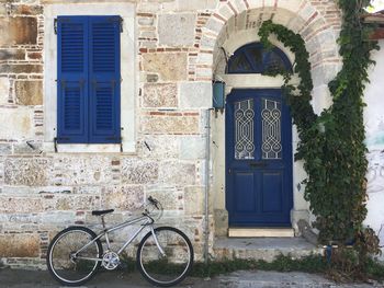 Bicycle parked outside building