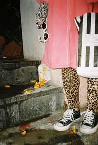 Low section of woman standing on floor