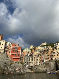 Buildings in city against sky