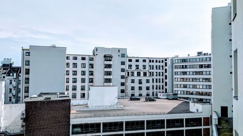 Buildings in city against sky