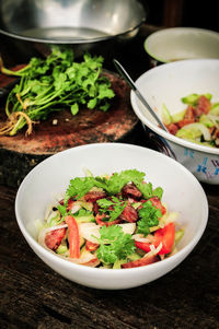 High angle view of vegetable salad in bowl on table