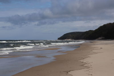 Scenic view of beach against sky