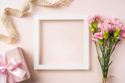 Directly above shot of pink flowers on table