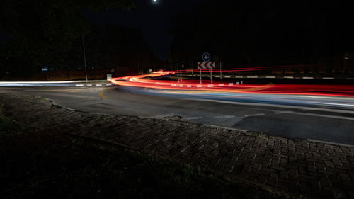 Light trails on road at night