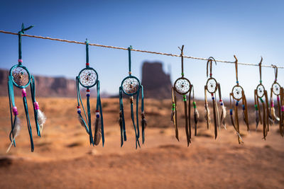 Low angle view of decoration hanging against sky