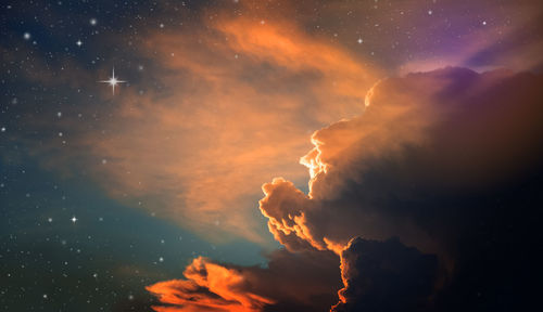 Low angle view of clouds in sky at night