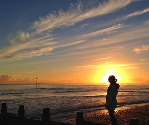Scenic view of sea at sunset