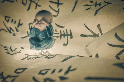 Portrait of cute boy painting