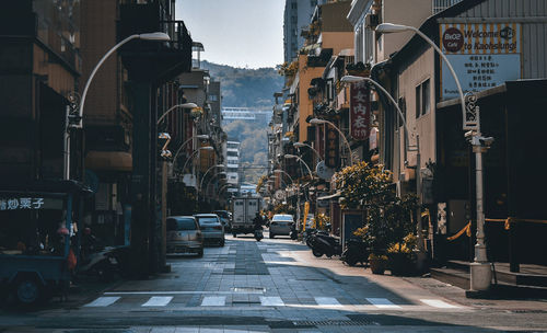 Street amidst buildings in city