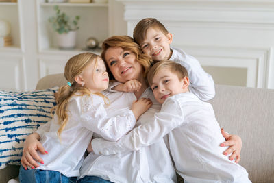 Portrait of happy family at home