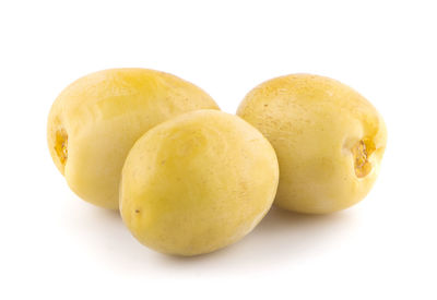 Close-up of oranges against white background