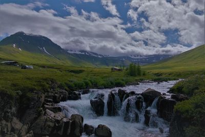 Scenic view of river against sky