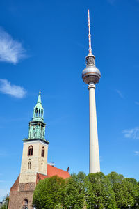 The famous tv tower and the marienkirche at alexanderplatz in berlin, germany