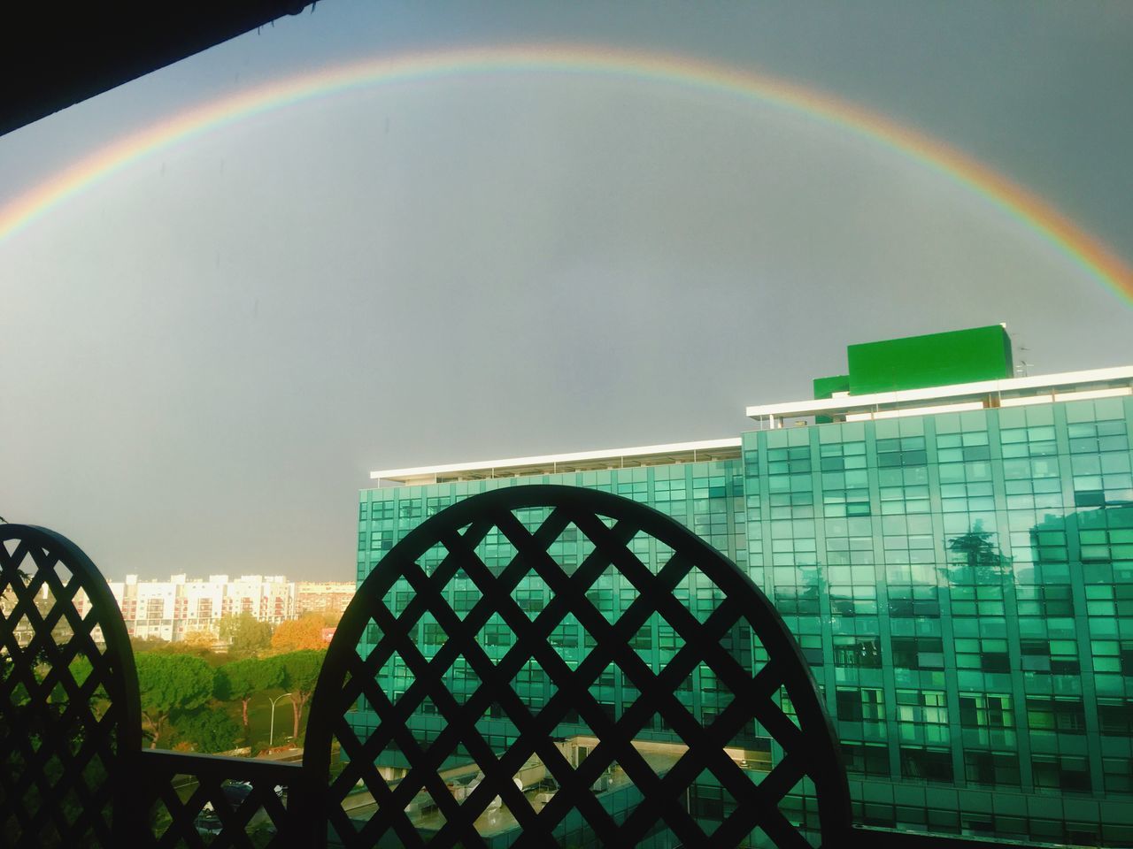 RAINBOW OVER GLASS BUILDING