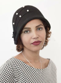 Portrait of a beautiful young woman over white background