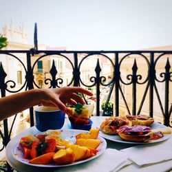 Midsection of person preparing food on table