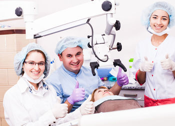 Portrait of doctors with patient