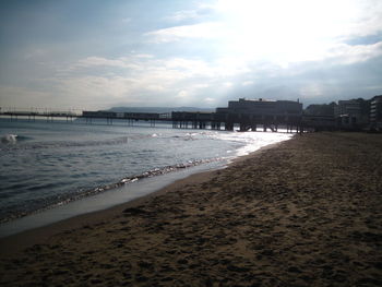 Pier over sea against sky