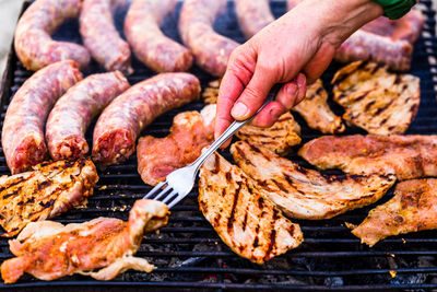 Close-up of meat on barbecue grill