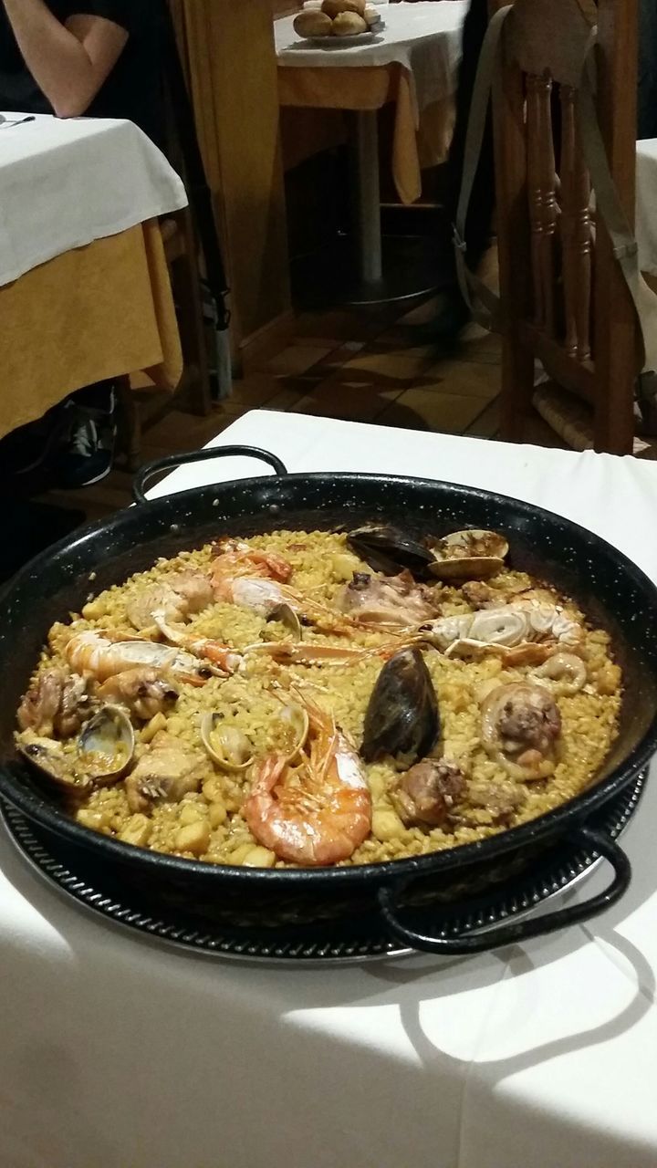 CLOSE-UP OF FOOD SERVED ON TABLE