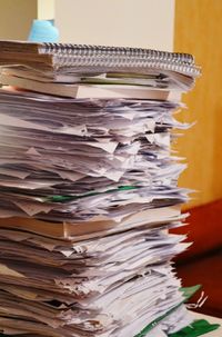 Close-up of papers on table