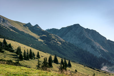 Scenic view of mountains against clear sky