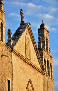 Low angle view of old building against sky