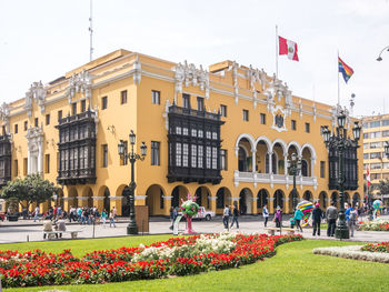 Group of people in front of building