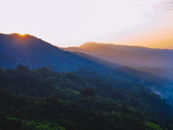 Beautiful nature of hills and mountain are complex with the atmosphere of the morning sunrise,