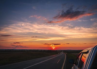 Road against sky during sunset