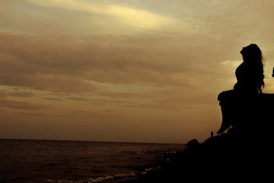 Scenic view of sea at sunset