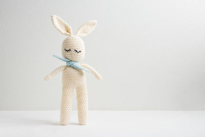 Close-up of stuffed toy against white background