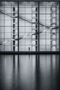 Reflection of man in airport