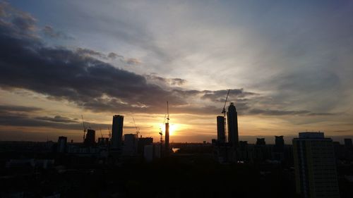 Cityscape against sky during sunset