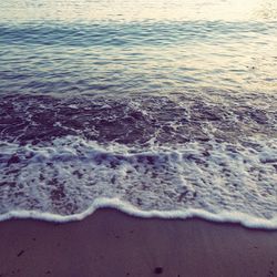 High angle view of surf on beach